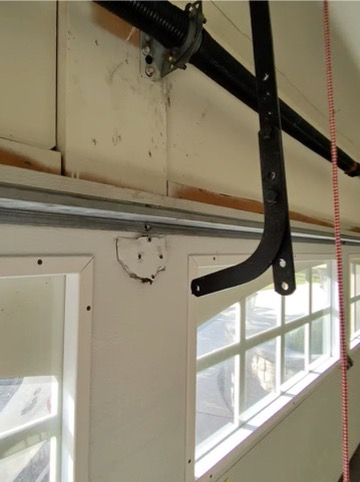 broken bracket on garage door - Garage door repair Kildeer, IL